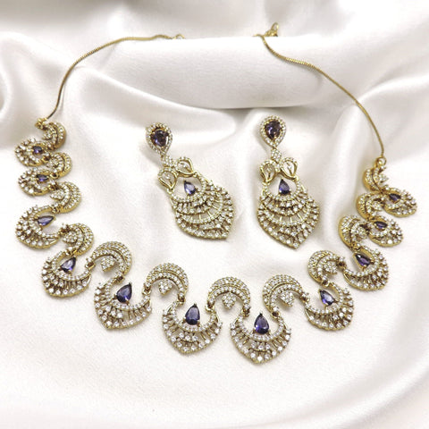 Violet CZ AD necklace set with matching earrings and gold-tone detailing by joyrias
