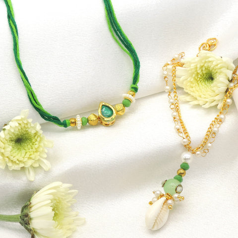 Emerald teardrop cowrie pearl bhaiya bhabhi rakhi set by Joyrias