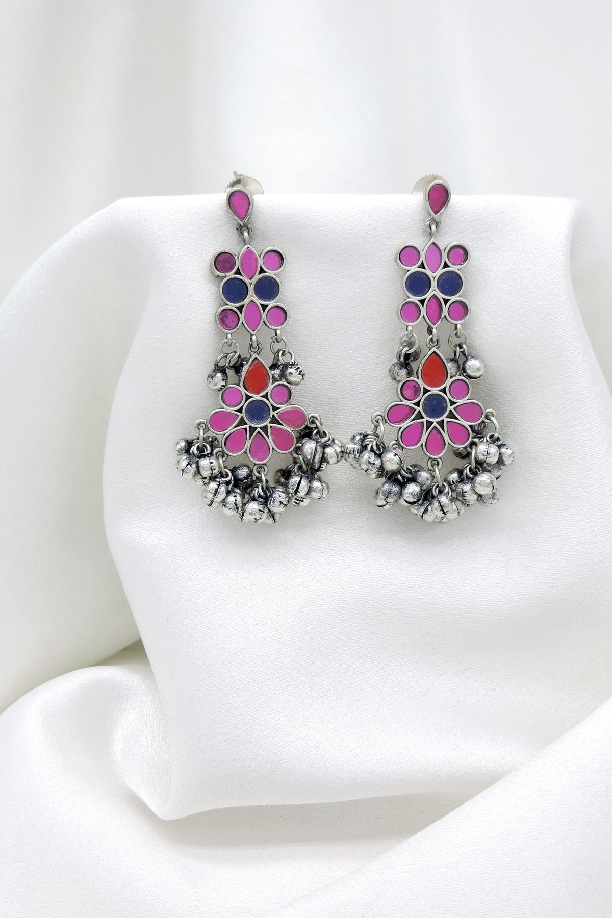 Oxidized silver multicolor floral long drop earrings with pink blue and red stone detailing by joyrias