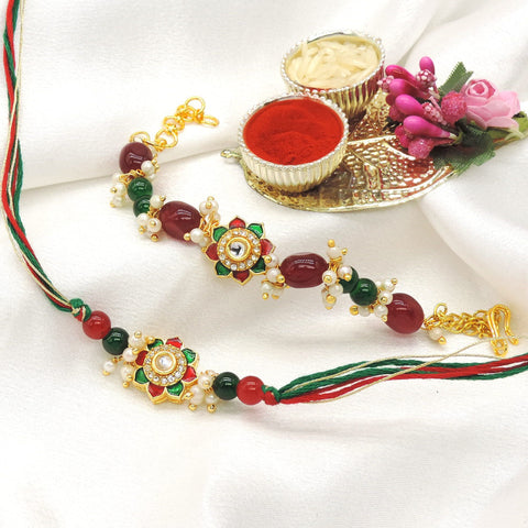 Floral meenakari kundan bead bhaiya bhabhi rakhi set by Joyrias