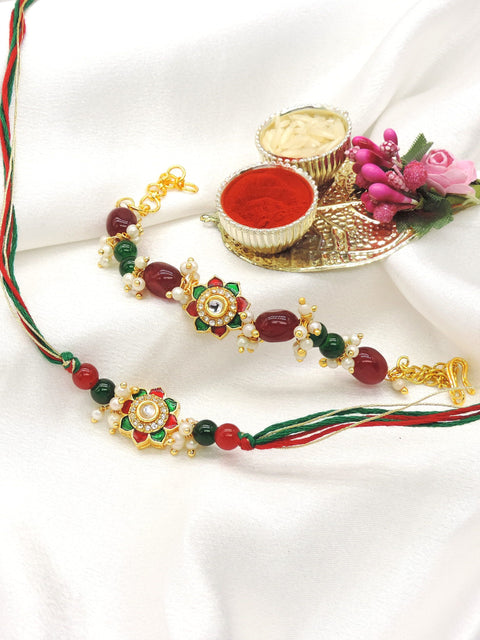 Floral meenakari kundan bead bhaiya bhabhi rakhi set by Joyrias