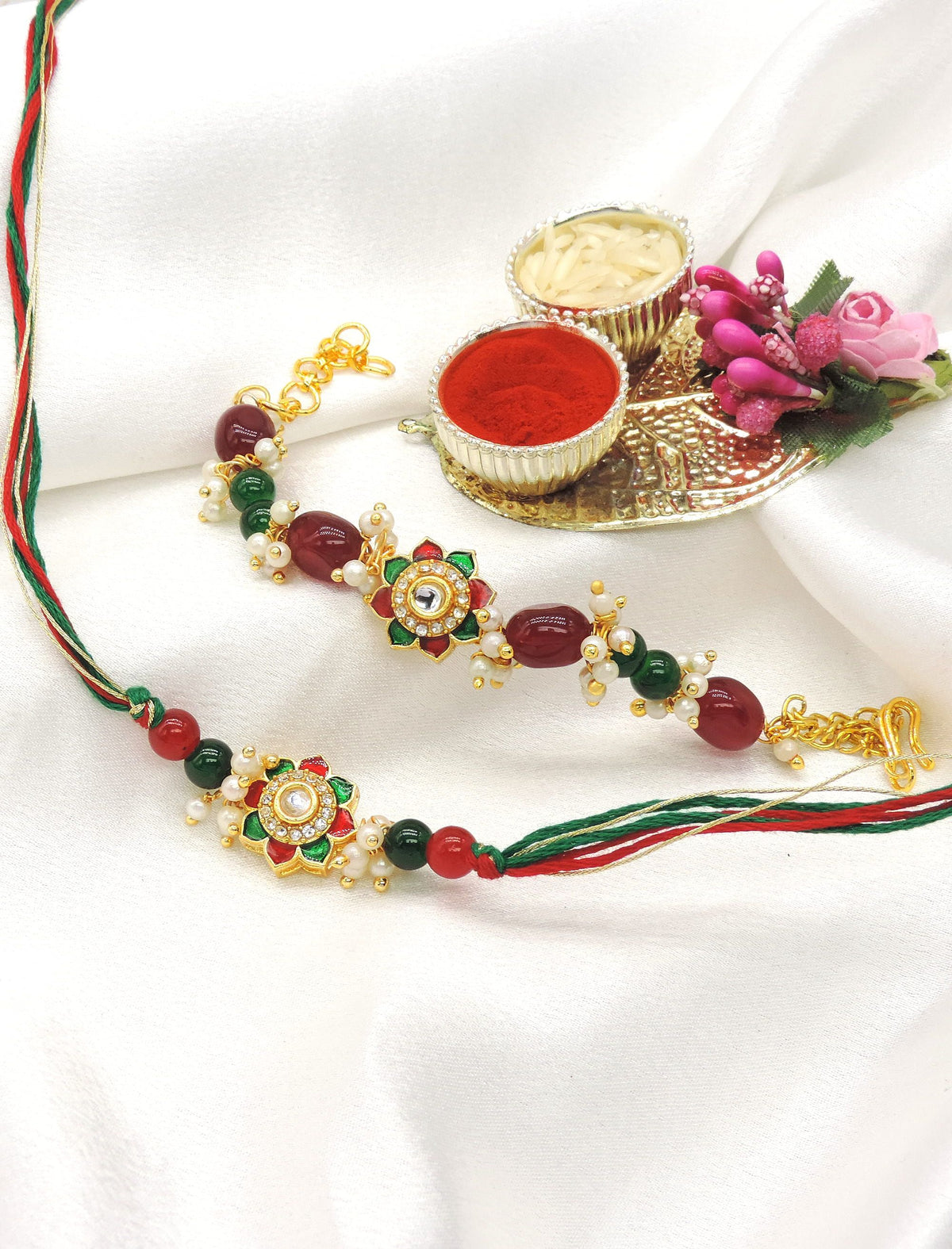 Floral meenakari kundan bead bhaiya bhabhi rakhi set by Joyrias