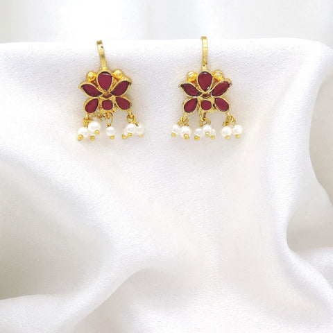 Gold-toned maroon floral pearl drop earrings with traditional detailing by joyrias