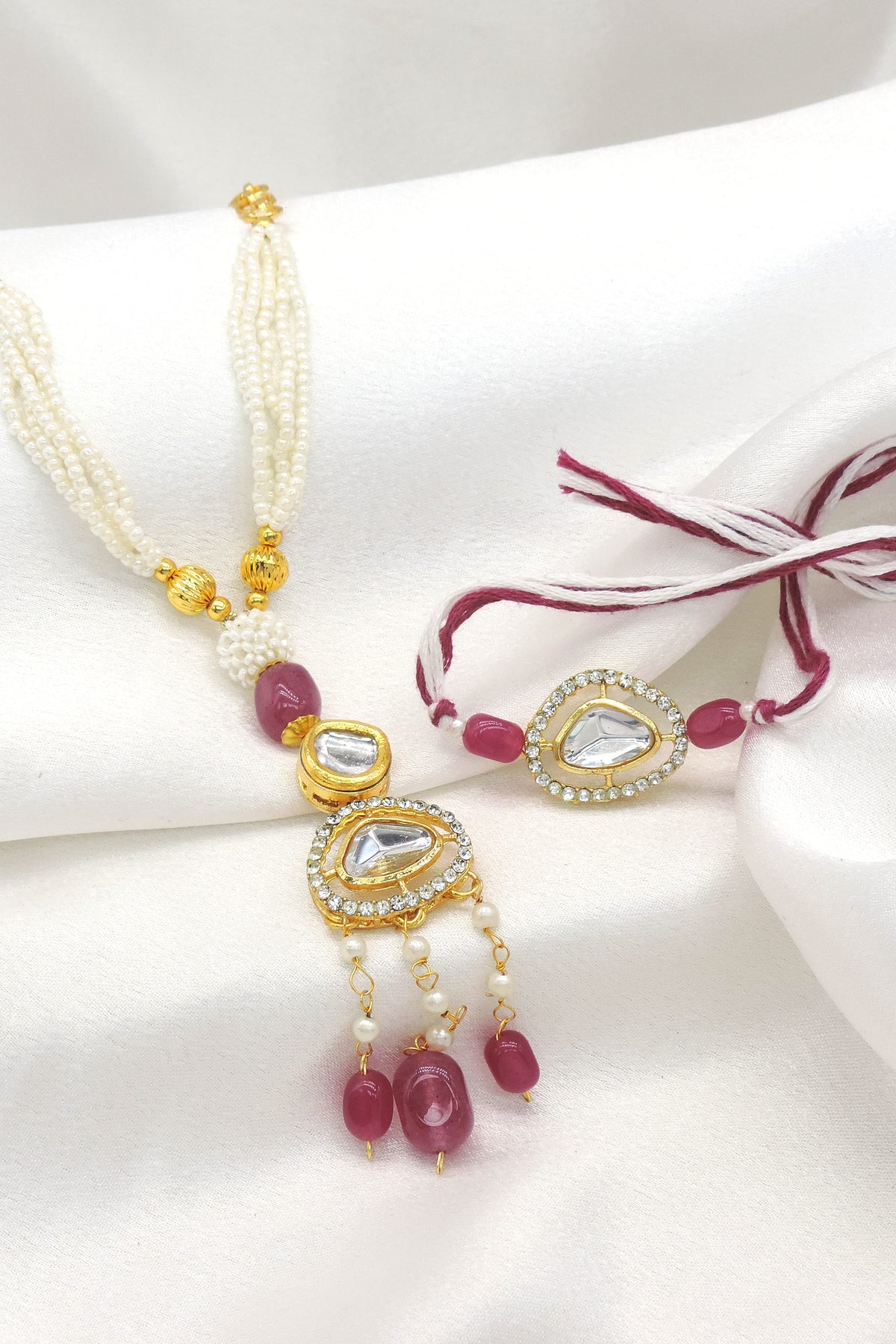 Ruby polki kundan pearl bhaiya bhabhi rakhi set by Joyrias