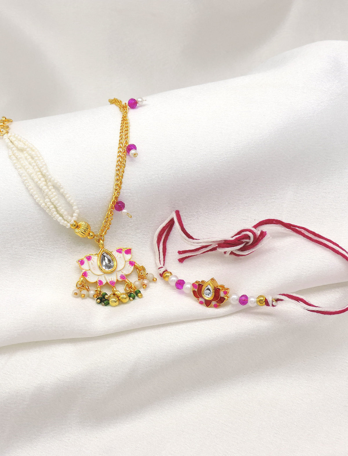 Lotus kundan meenakari pearl bhaiya bhabhi rakhi set by Joyrias