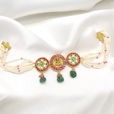 Regal pink temple necklace with pearl strands and green stone accents by joyrias