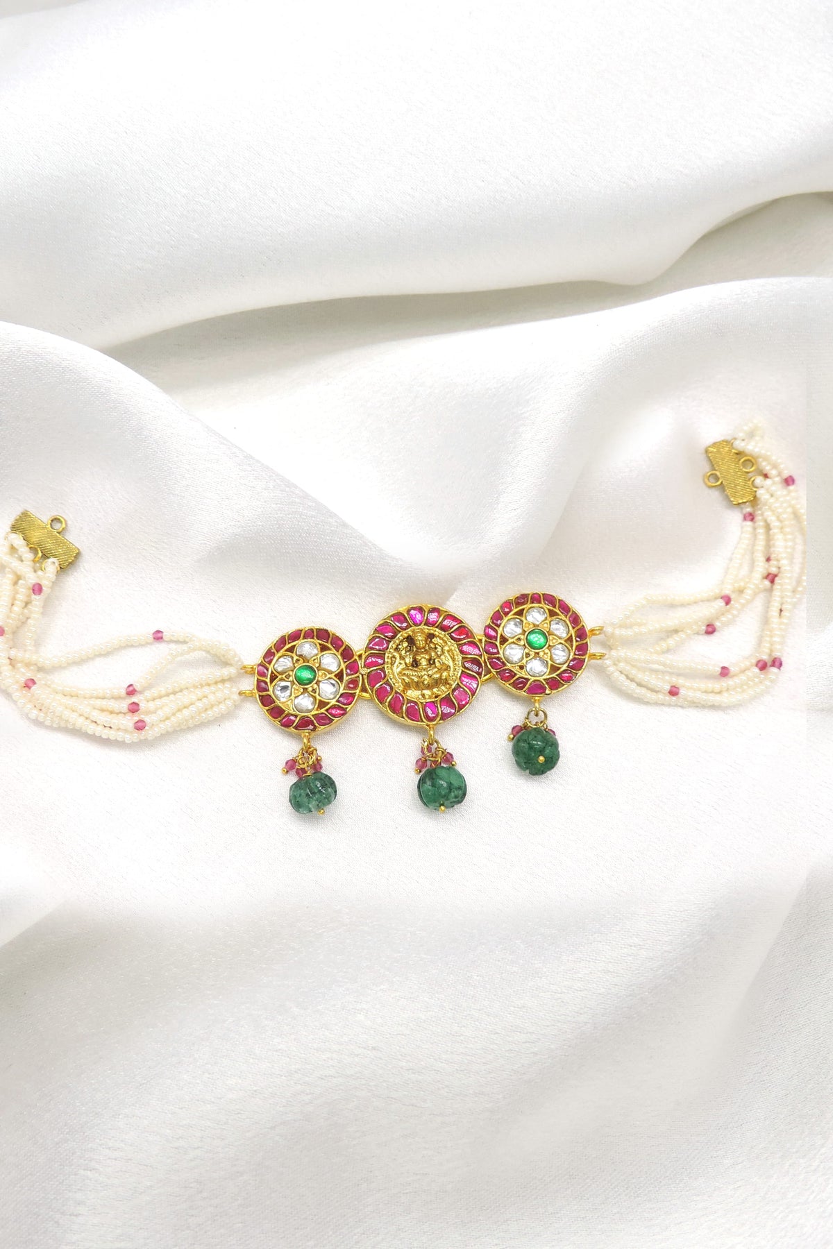 Regal pink temple necklace with pearl strands and green stone accents by joyrias