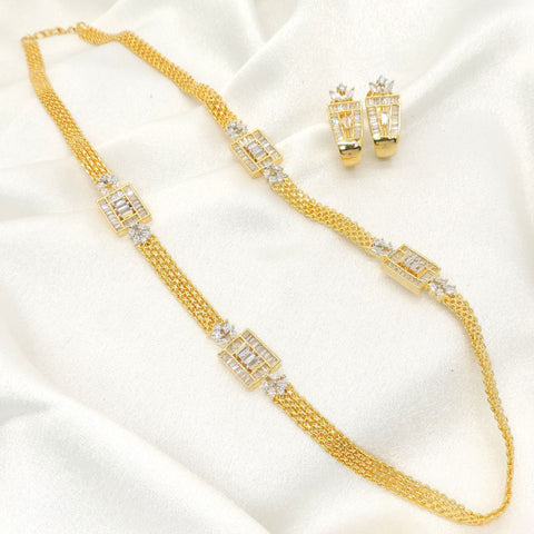 Luxe gold layered CZ necklace set with crystal accents and matching earrings