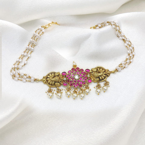 Pink pearl temple necklace with gold-tone floral detailing by joyrias