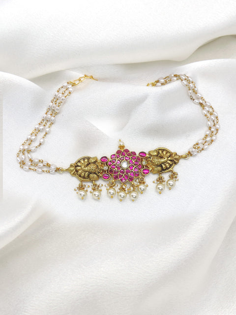 Pink pearl temple necklace with gold-tone floral detailing by joyrias