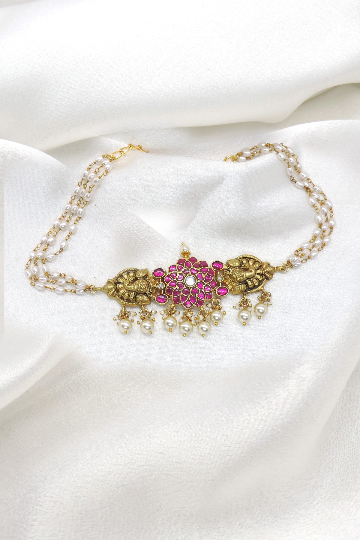 Pink pearl temple necklace with gold-tone floral detailing by joyrias