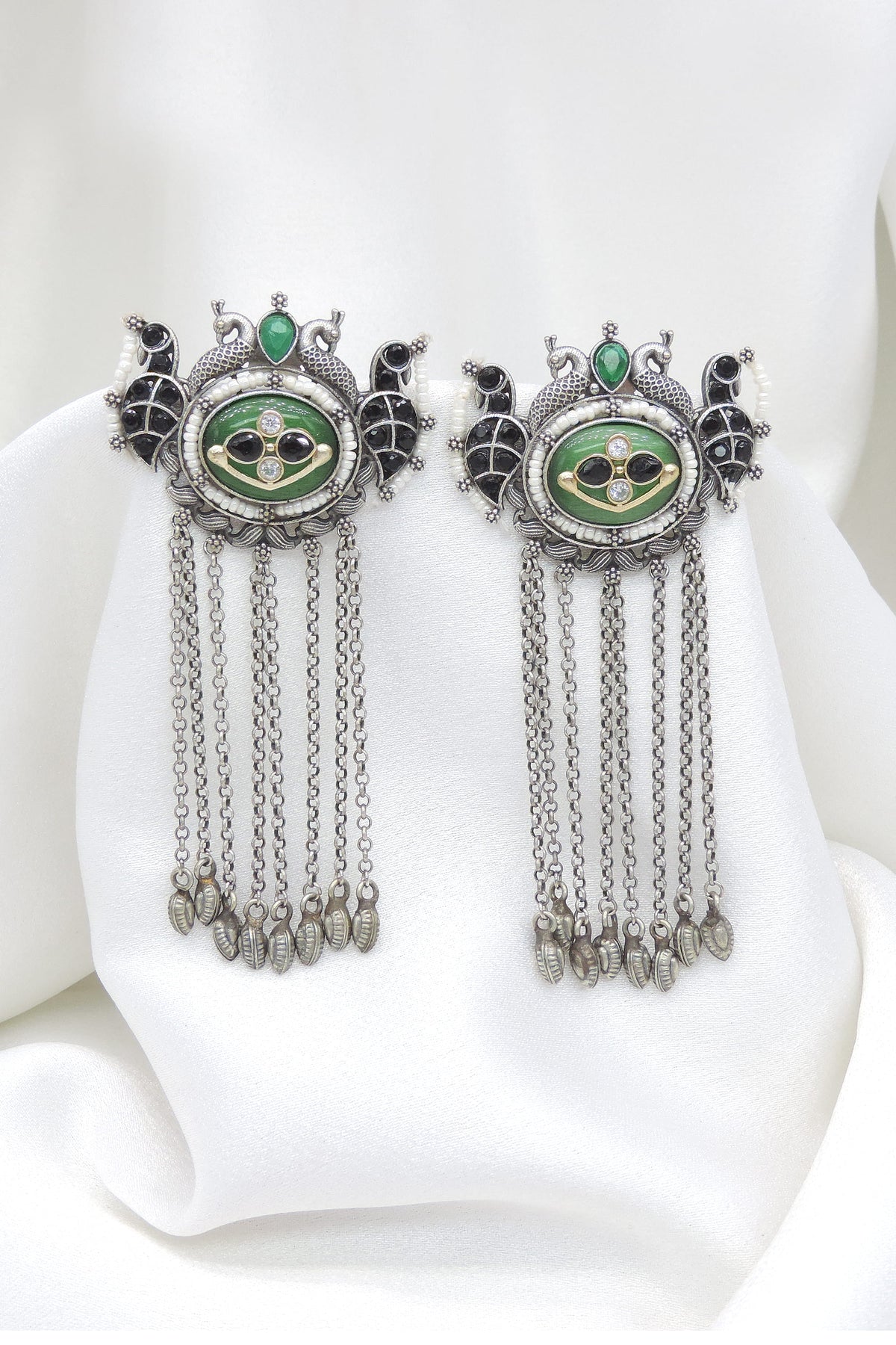 Oxidized dual-tone green stone long chain earrings with traditional bird detailing by joyrias