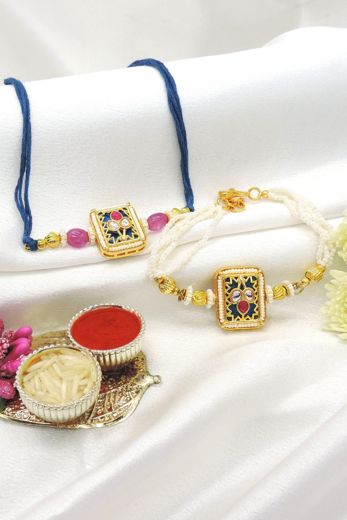Navy blue enamel kundan bhaiya bhabhi rakhi set by Joyrias