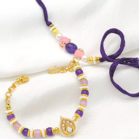 Purple pink kundan pearl bhaiya bhabhi rakhi set by Joyrias