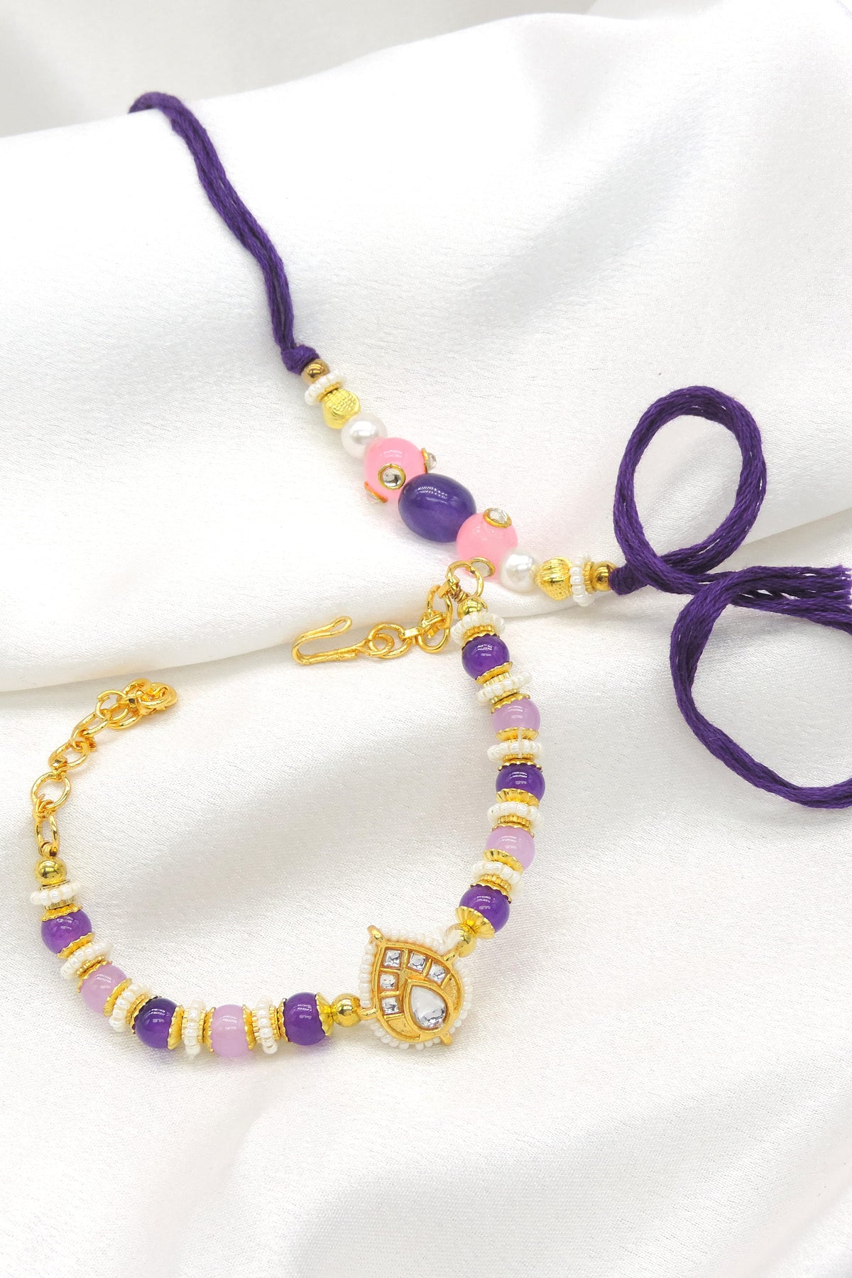 Purple pink kundan pearl bhaiya bhabhi rakhi set by Joyrias