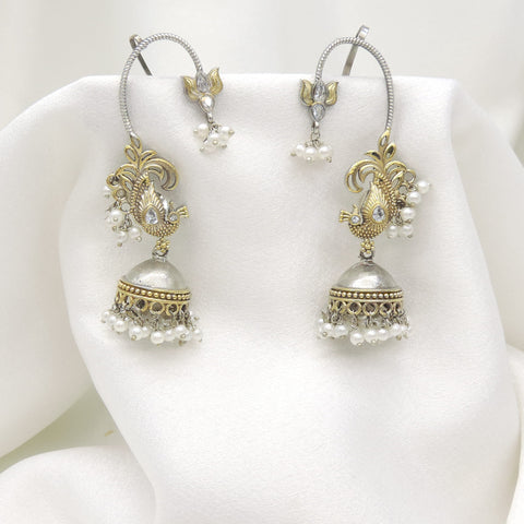 Oxidized dual-tone paisley ear cuff earrings with gold-toned detailing and pearl accents by joyrias