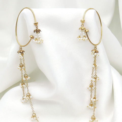 Gold-toned pearl long chain ear cuff earrings with delicate floral detailing by joyrias