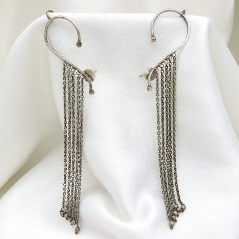 Oxidized silver long chain ear cuff earrings with delicate tassel detailing by joyrias