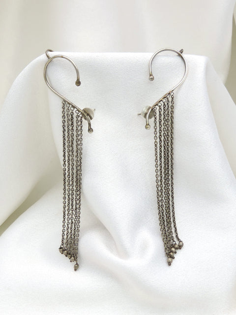 Oxidized silver long chain ear cuff earrings with delicate tassel detailing by joyrias