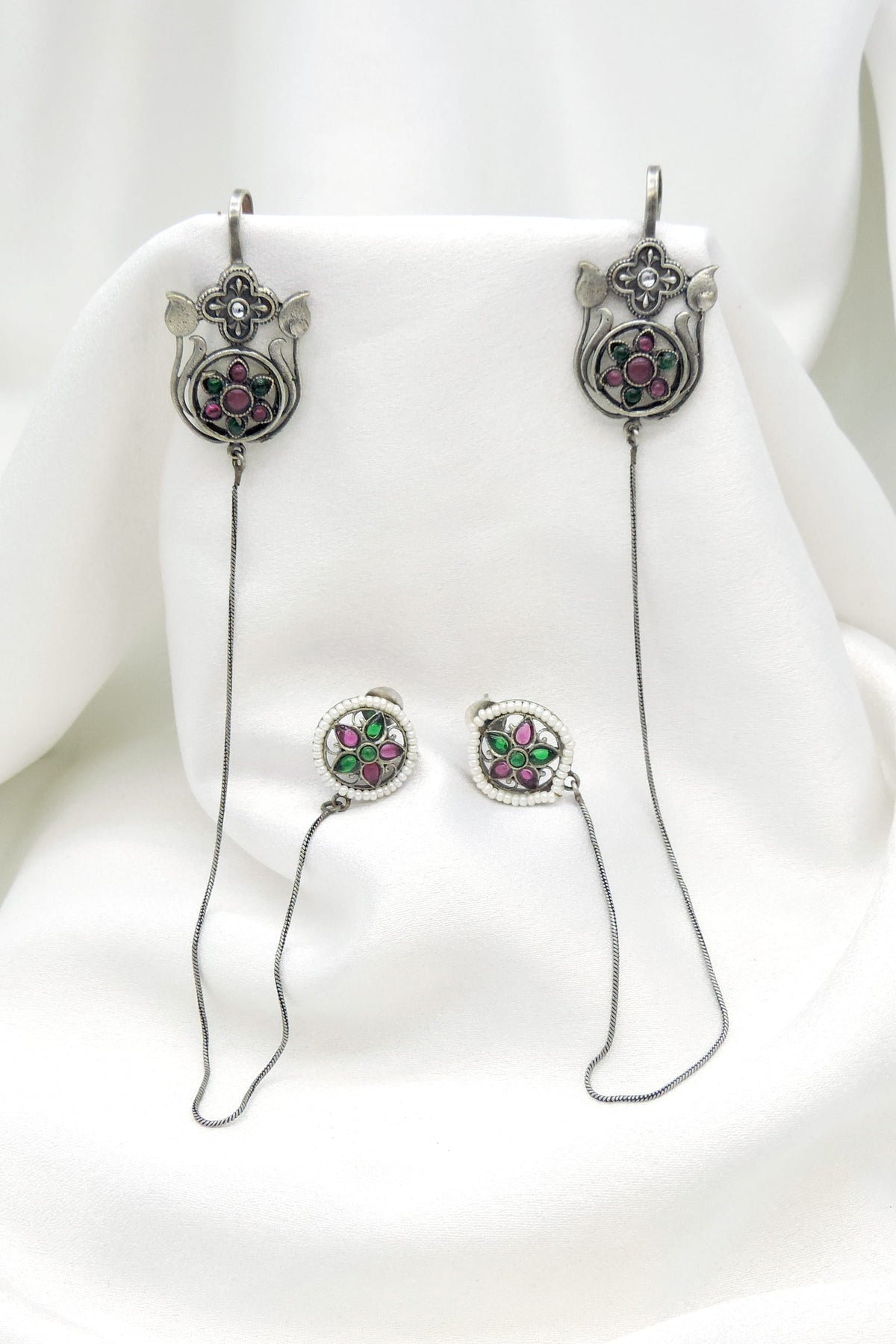 Oxidized silver green pink floral ear cuff earrings with delicate chain and bead detailing by joyrias