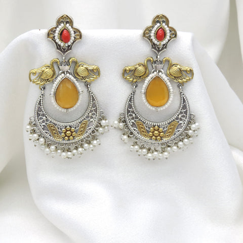 Oxidized dual-tone maroon yellow chandbali pearl earrings with intricate traditional detailing by joyrias