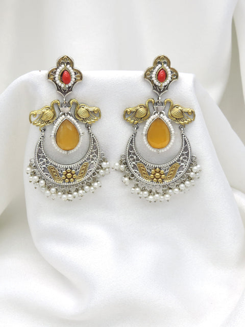 Oxidized dual-tone maroon yellow chandbali pearl earrings with intricate traditional detailing by joyrias