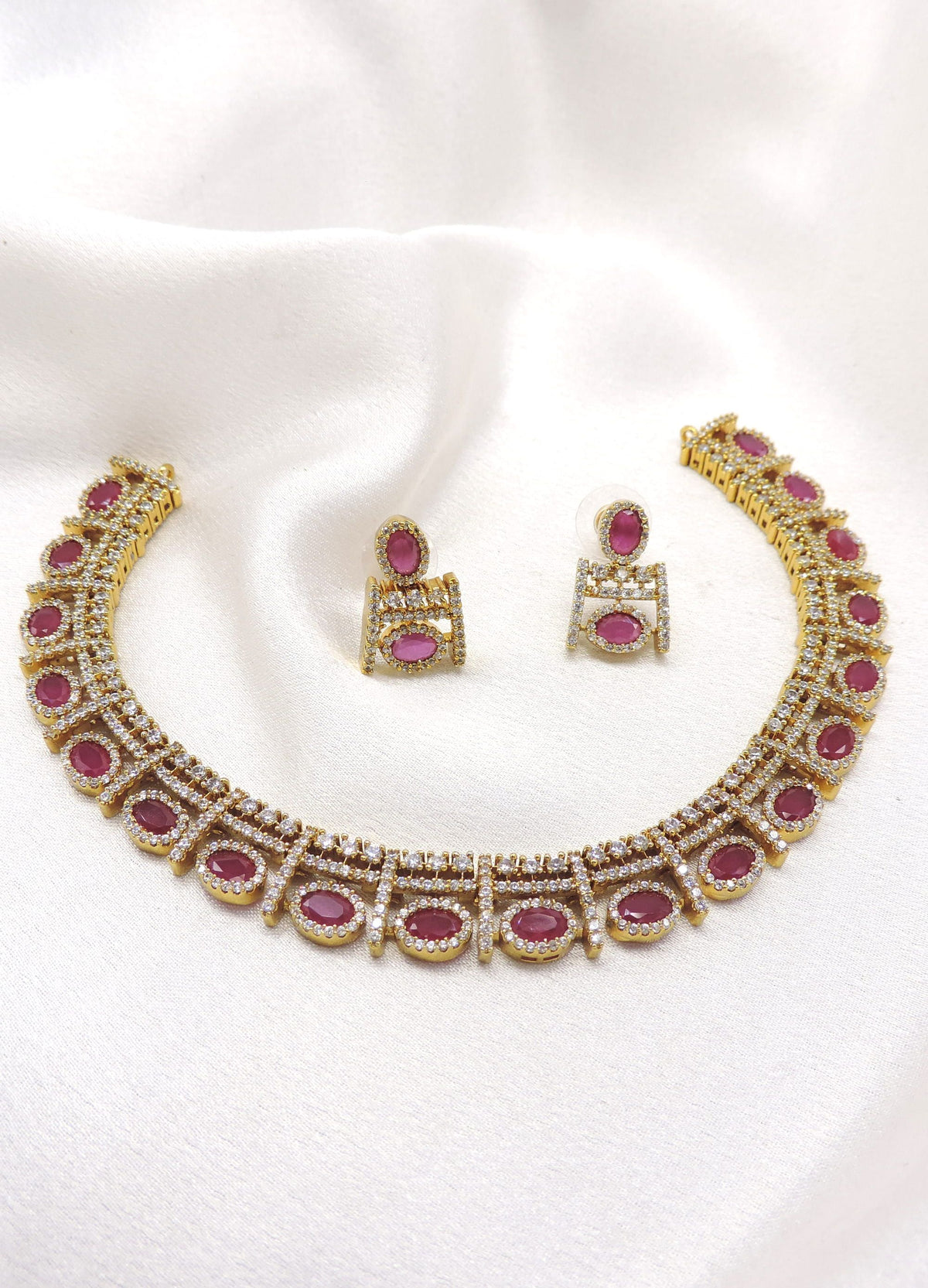 Wine-toned CZ AD jewelry set with matching necklace and earrings by joyrias