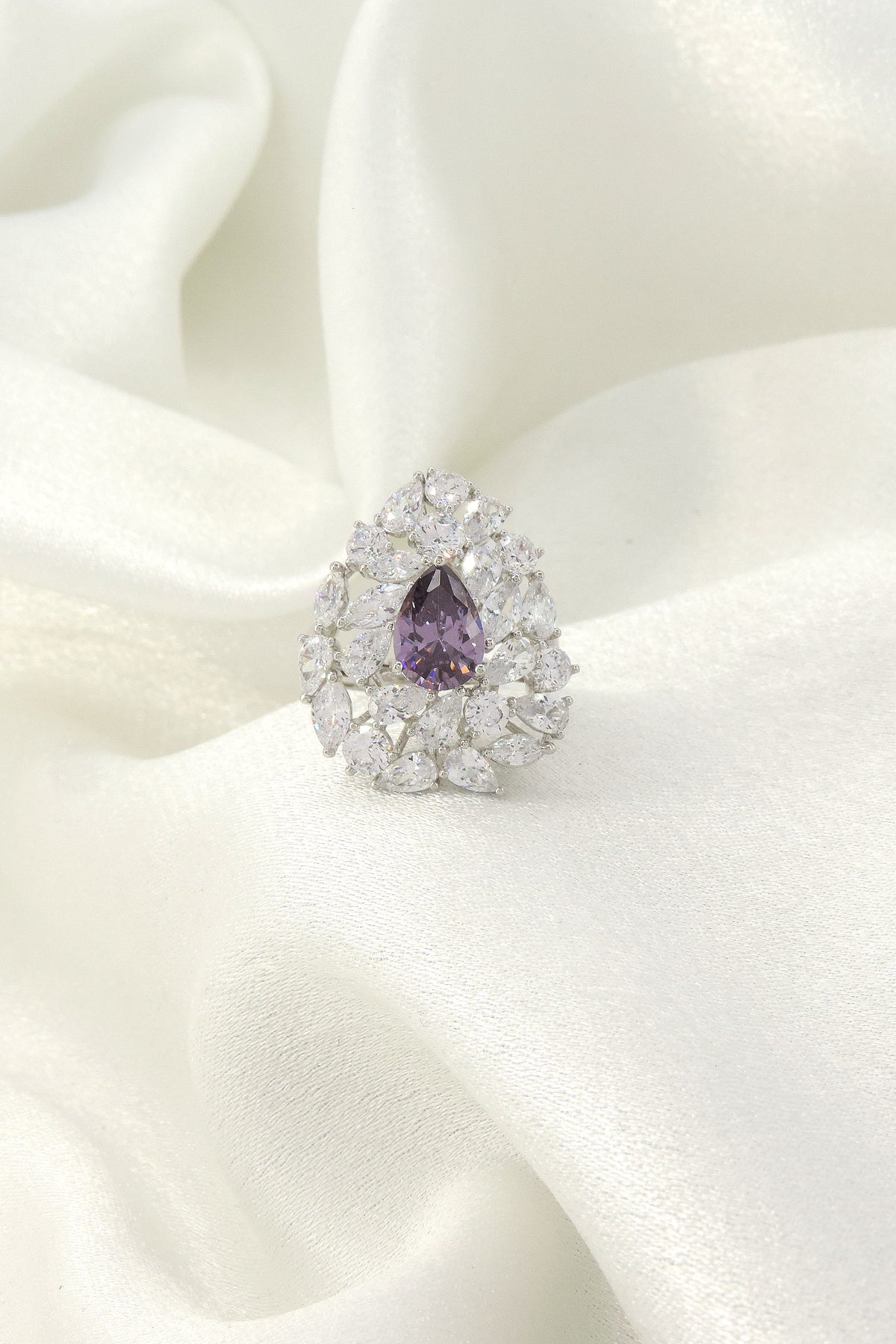 Purple pear AD CZ cocktail ring by Joyrias