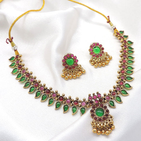 Meenakari green and ruby necklace with matching earrings by joyrias