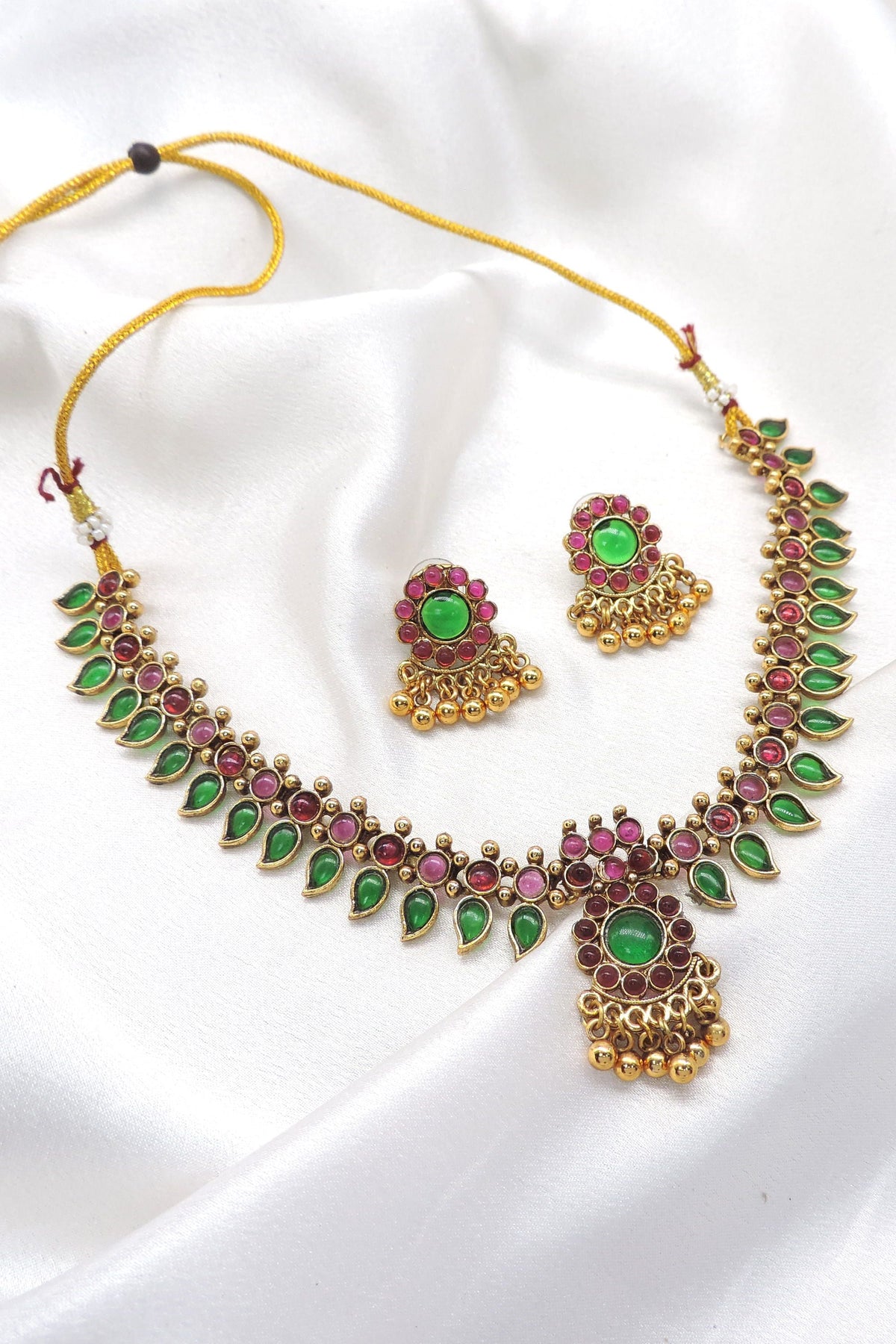 Meenakari green and ruby necklace with matching earrings by joyrias
