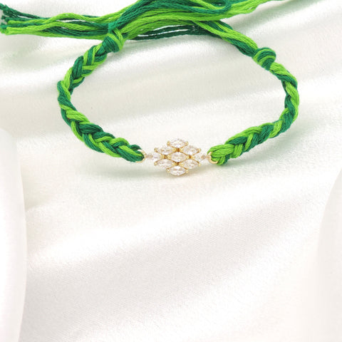Green Zircon Floral Bhaiya Rakhi by Joyrias