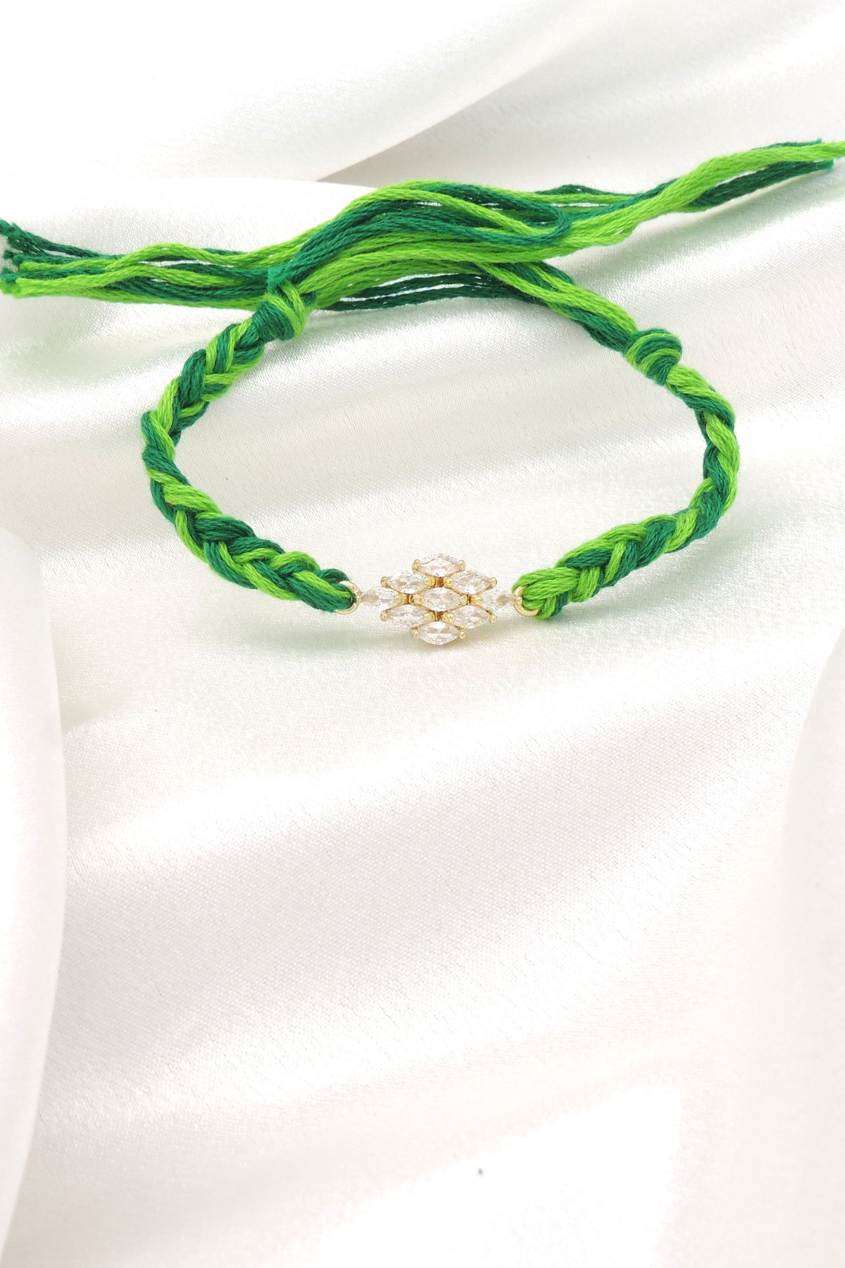 Green Zircon Floral Bhaiya Rakhi by Joyrias