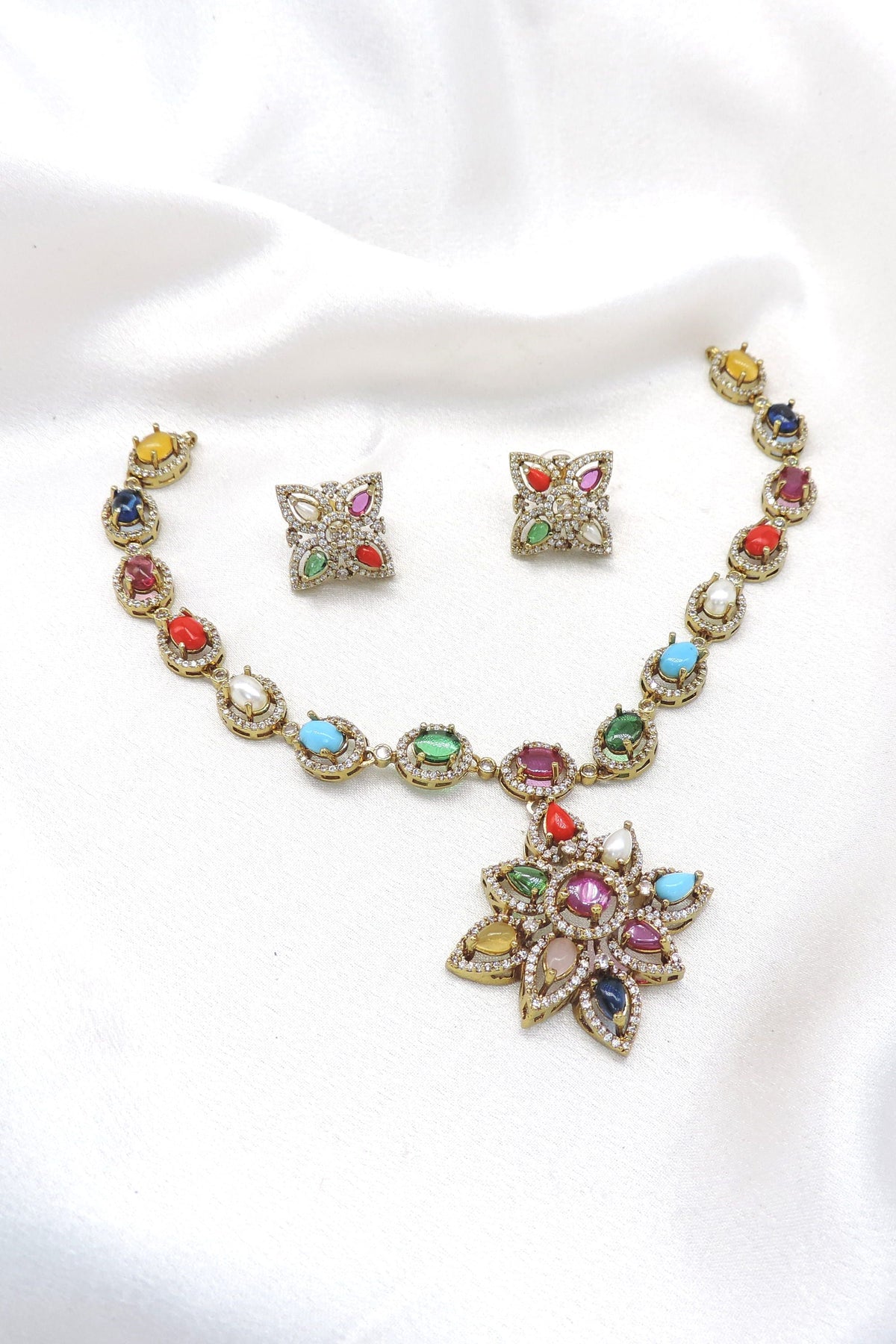 Multicolor floral pendant necklace set with matching earrings by joyrias