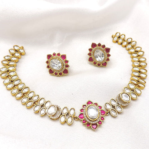 Crimson kundan floral necklace set with matching earrings by joyrias