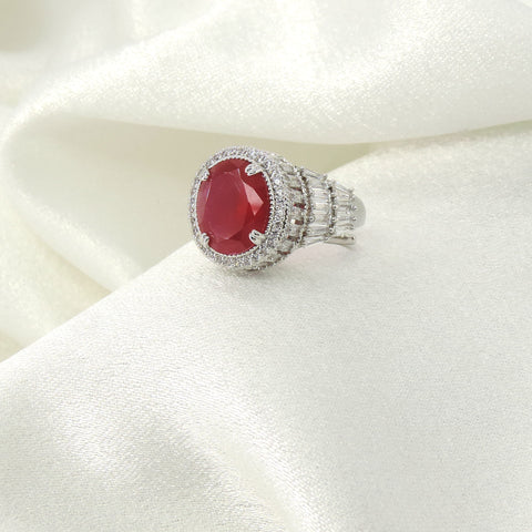 Ruby red oval CZ baguette shoulder cocktail ring by Joyrias