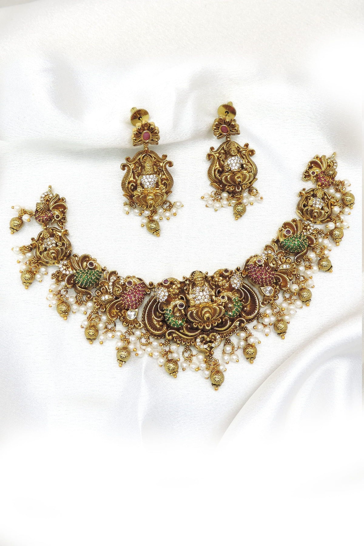 Temple peacock pearl necklace set by Joyrias