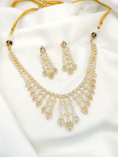 Gold plated layered teardrop necklace set with sparkling stones and matching earrings