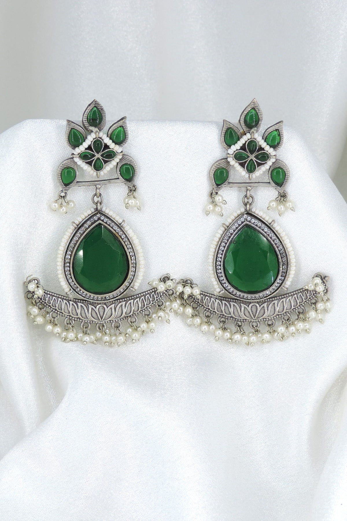 Oxidized silver green stone chandbali jhumka earrings with pearl detailing by joyrias