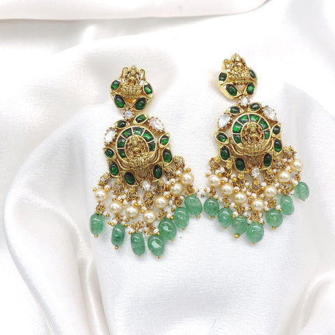 Temple gold-toned Lakshmi necklace set with green stones and pearl drops by joyrias