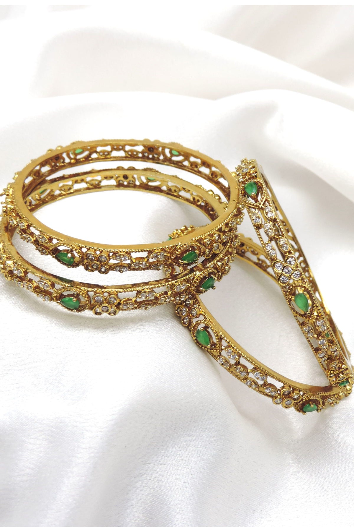 Emerald floral CZ AD bangle set with gold-tone detailing by joyrias