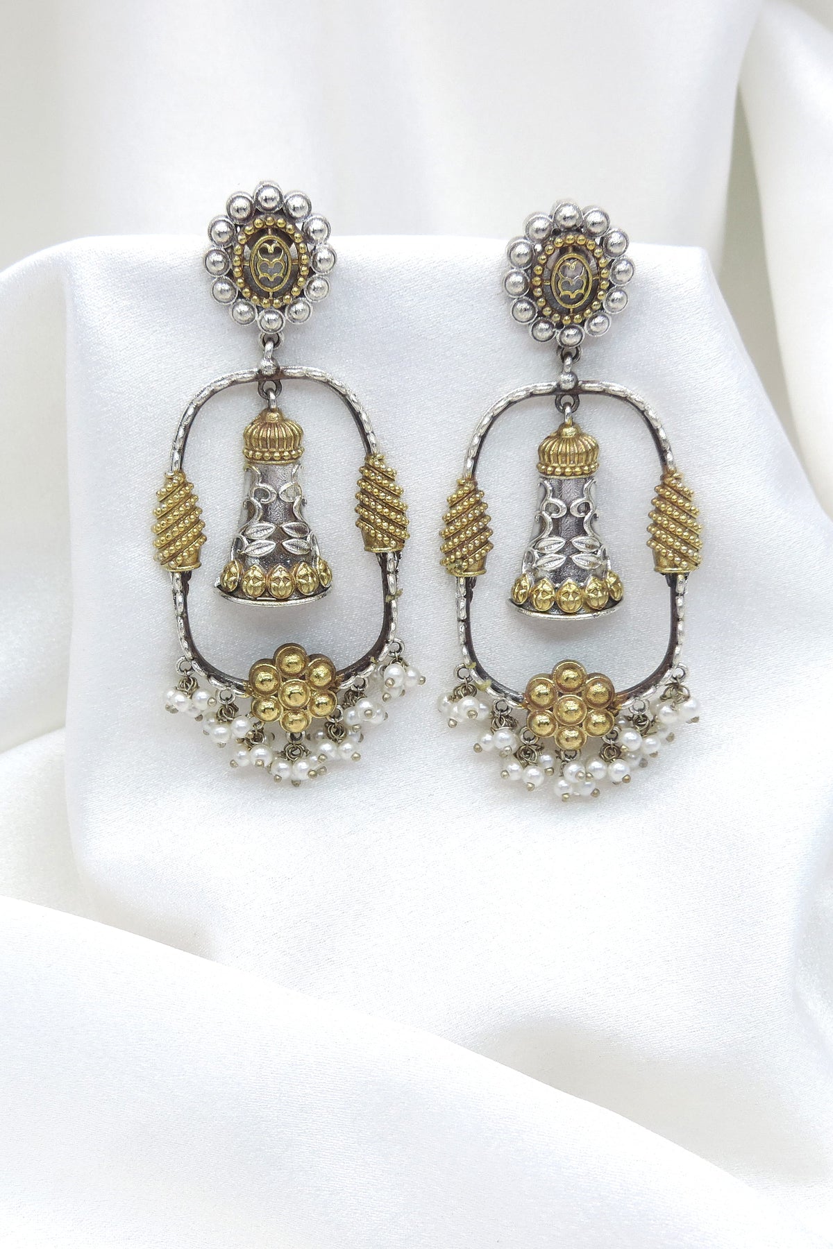 Oxidized silver gold-toned jhumka drop earrings with pearl detailing by joyrias