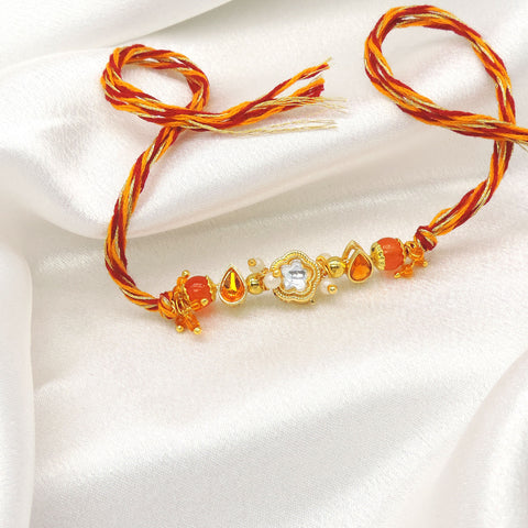 Designer Kundan Rakhi with Orange Crystal Beads