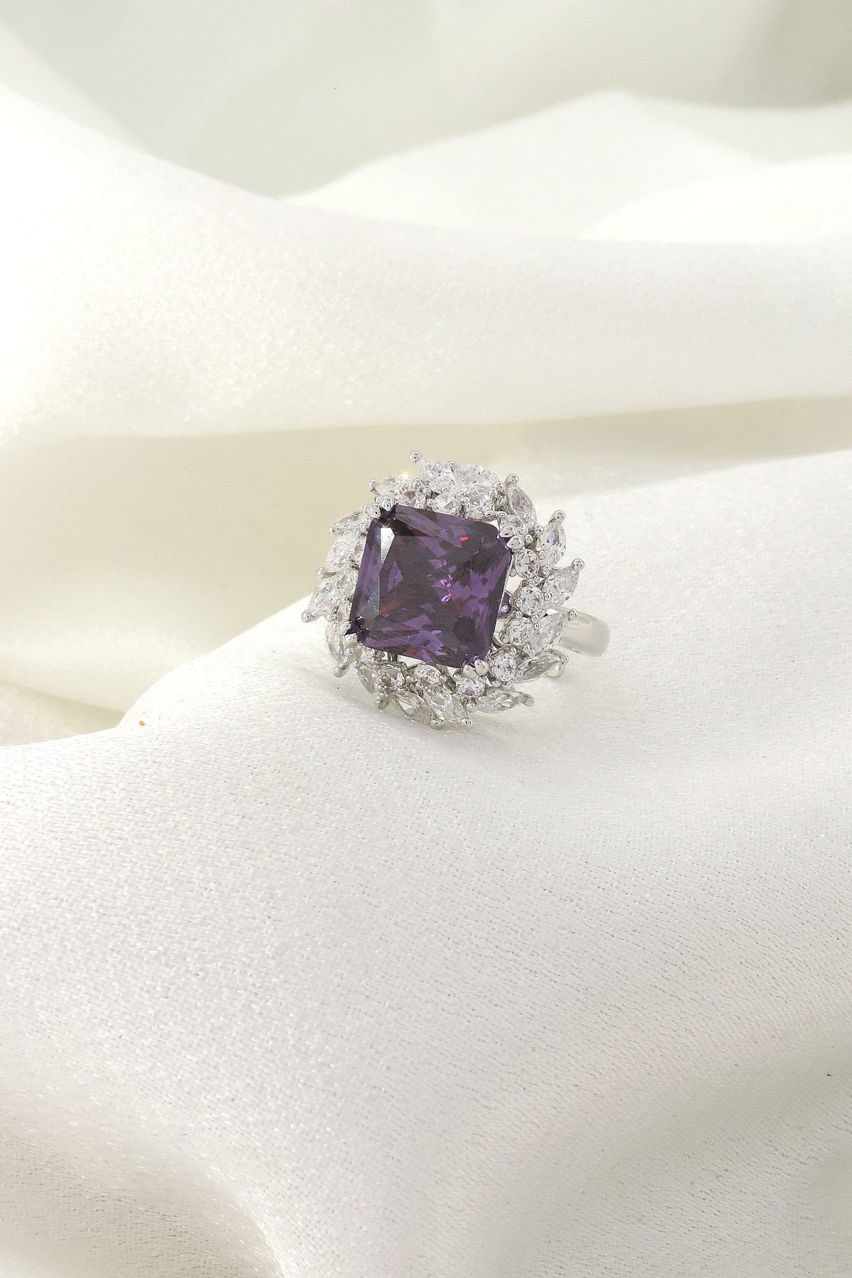 Violet halo cocktail ring by Joyrias