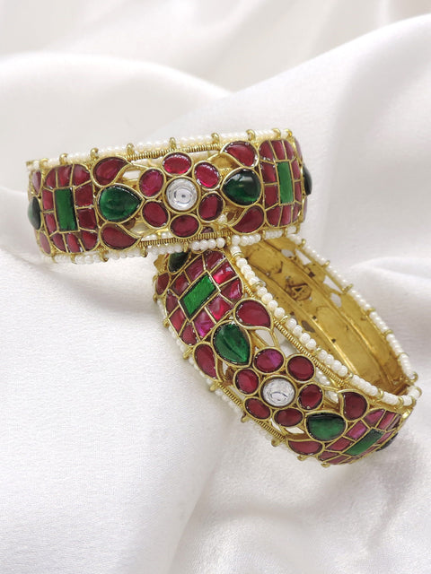 Ruby green kundan bangle set with pearl detailing by joyrias