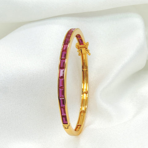 Ruby red baguette gold tone kada bracelet by Joyrias