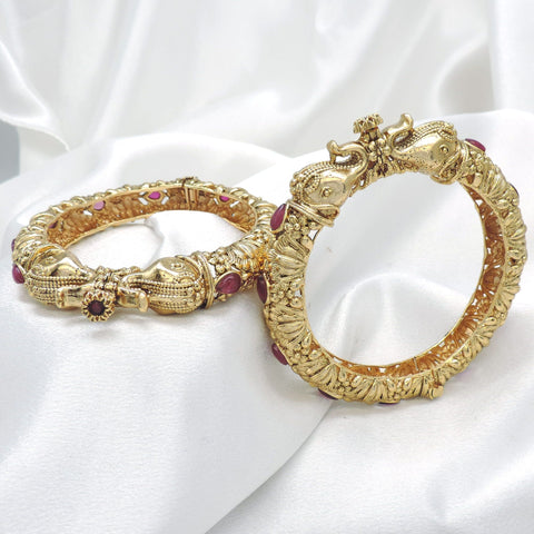 Antique gold kada bangle pair with ruby stone detailing by joyrias
