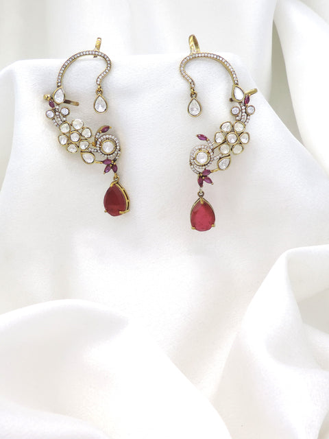 Gold-toned ruby kundan floral ear cuff earrings with teardrop stone detailing by joyrias