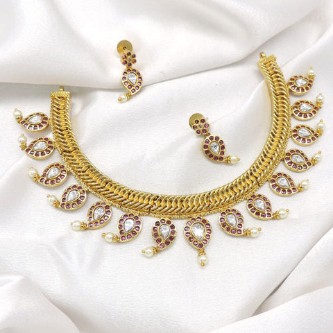 Antique kundan pink ruby choker necklace set with pearl drops and matching earrings by joyrias