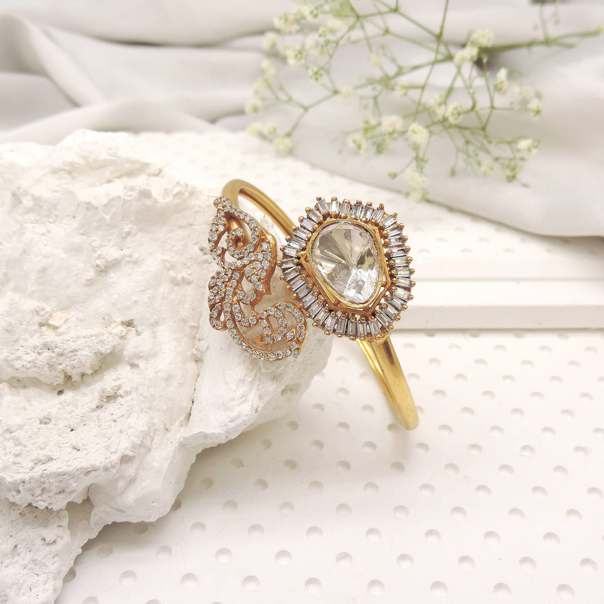 Open cuff bracelet with kundan center and baguette halo detailing