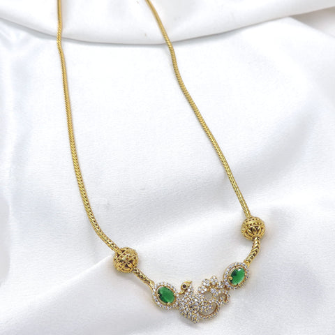 Gold chain necklace with peacock CZ AD pendant and emerald stones by joyrias